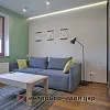 Фото ремонту гостьової для молодого юнака в оливковому кольорі