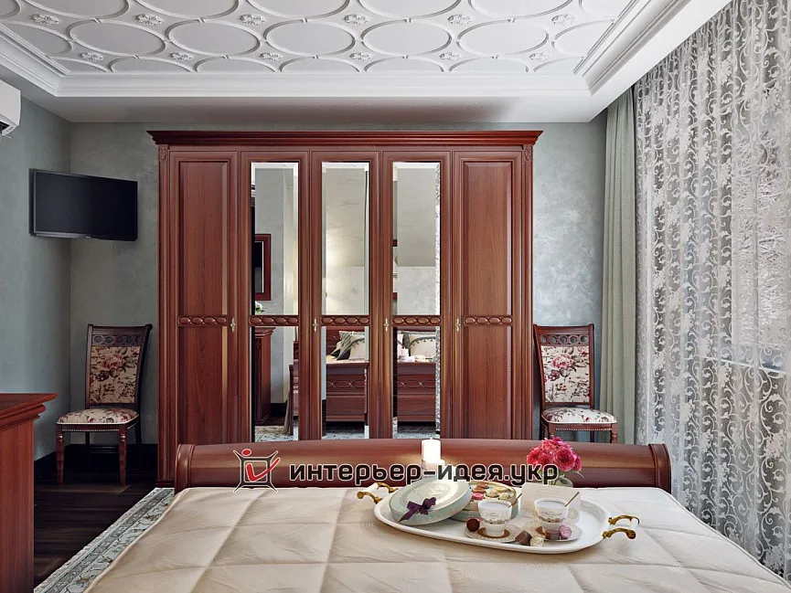 Дизайн спальні на мансардному поверсі в класичному стилі